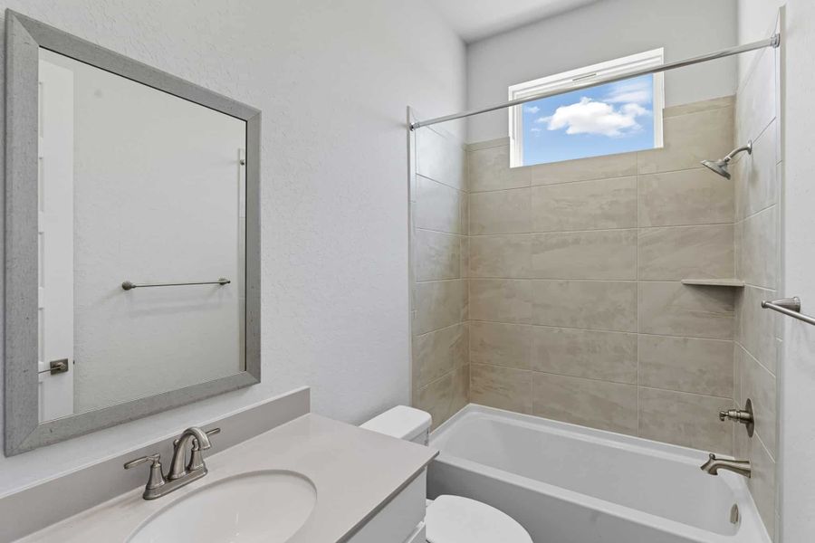 Furnished interior view inside a new home in Prominence – Now Selling, San Antonio (Image 29).