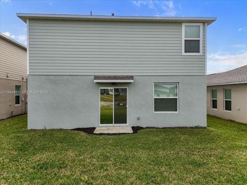 Exterior details and patio area of a home in , Lehigh Acres (Image 3).