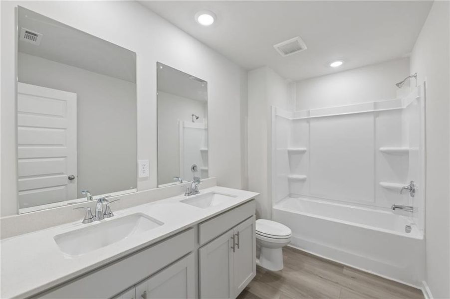 Furnished interior view inside a new home in Martin Springs - Estate Series, Lawrenceville (Image 14).