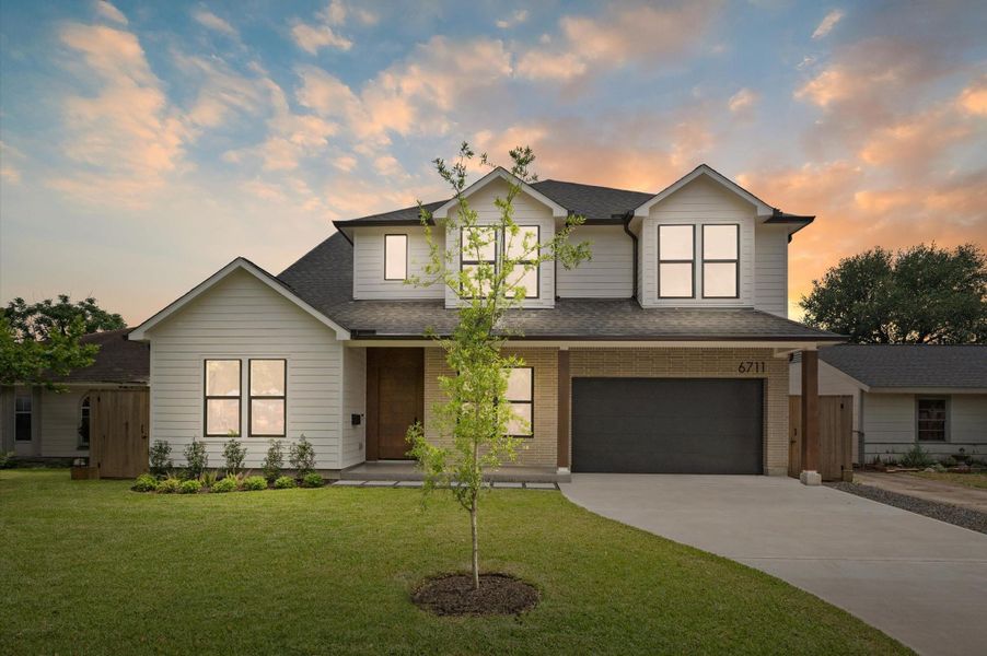 A bold modern statement, framed by thoughtful landscaping and a wide, welcoming facade — this is HOME at first sight. A bold modern statement, framed by thoughtful landscaping and a wide, welcoming facade — this is HOME at first sight.