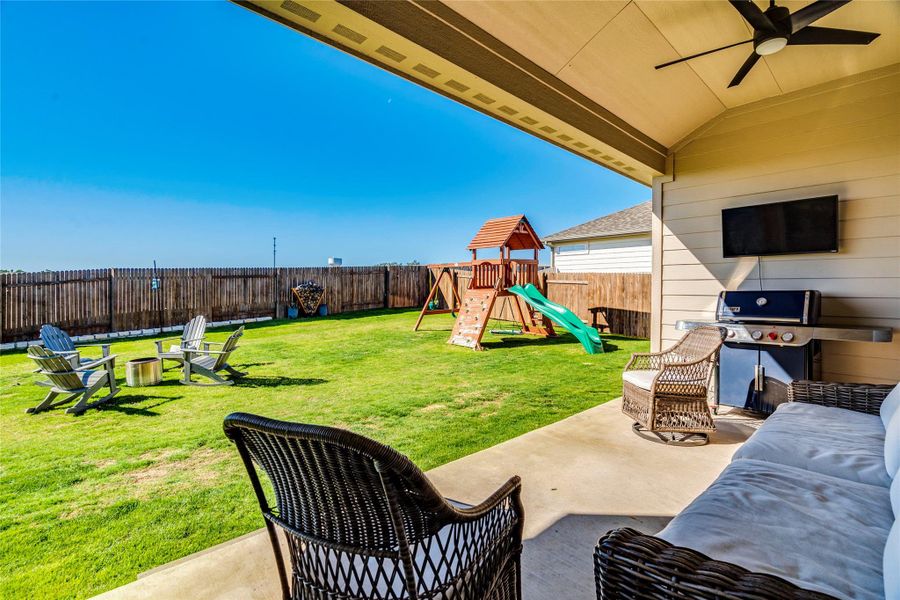 Covered patio with views of the Dripping Springs water tower.