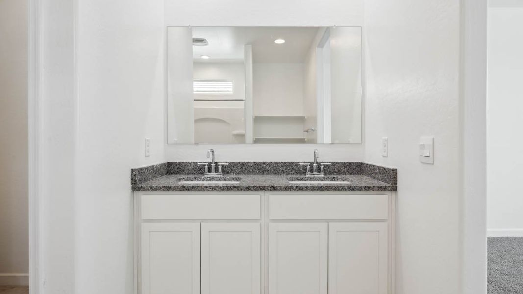 Representative furnished interior of a home built from the Mitchell by D.R. Horton in Upper Canyon, Phoenix (Image 11).