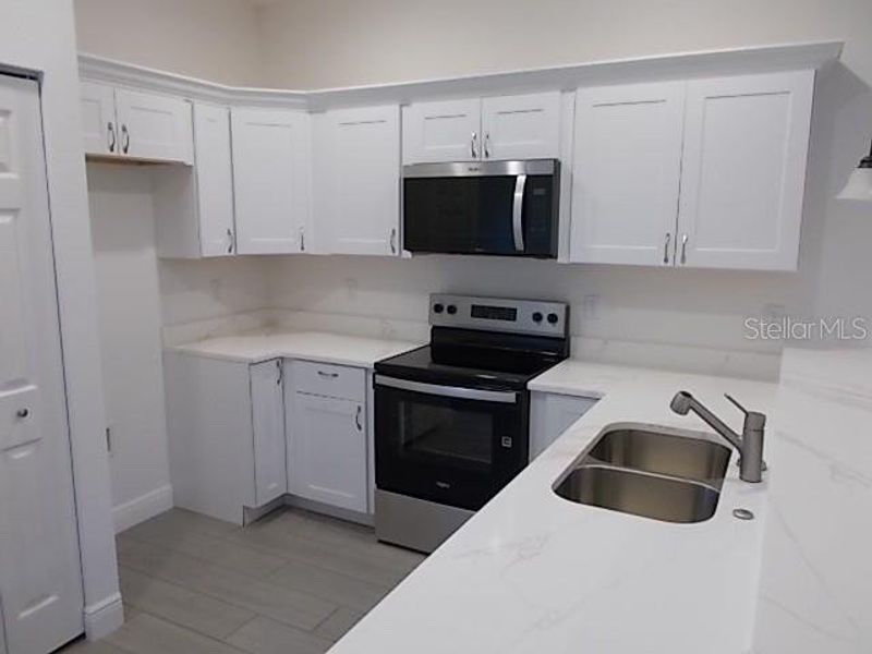Furnished interior view inside a new home in , Daytona Beach (Image 9).