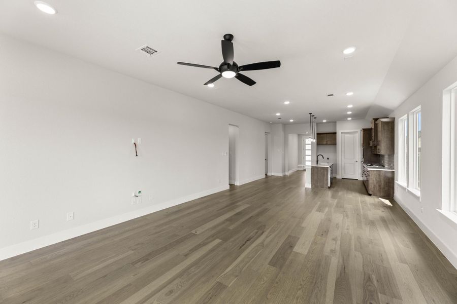 Representative unfurnished interior of a home built from the Aspen by Tri Pointe Homes in Treeline, Justin (Image 13).
