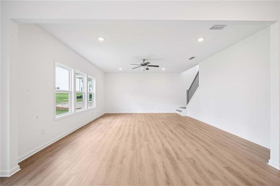 Spacious, unfurnished interior of a new home in Eastlyn Crossing, Flowery Branch (Image 20).