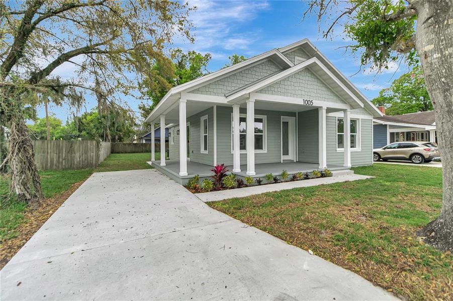 Front exterior of a new home in , Plant City, FL, highlighting curb appeal (Image 25).