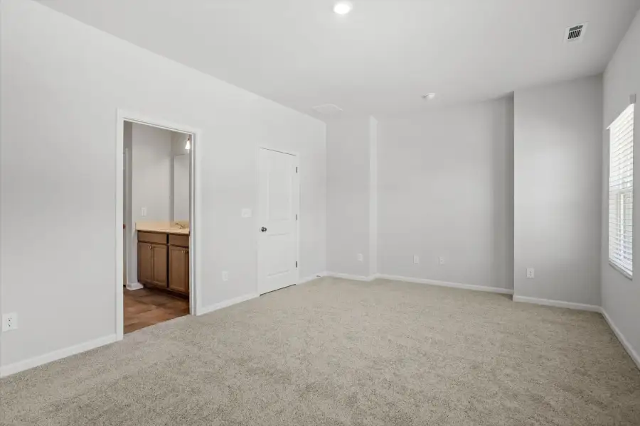 Spacious, unfurnished interior of a new home in West Main Townhomes, Sanford (Image 21). Spacious, unfurnished interior of a new home in West Main Townhomes, Sanford (Image 21).