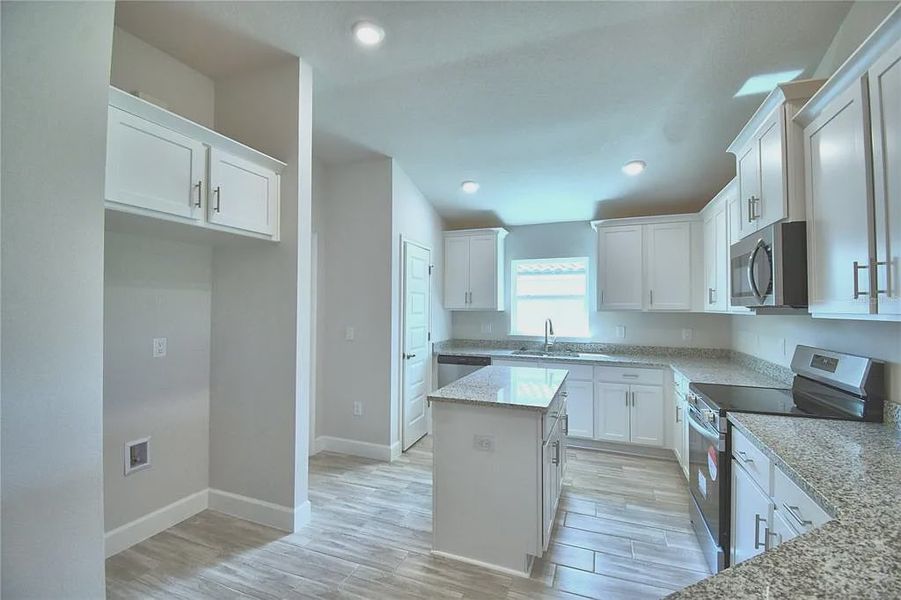 Furnished interior view inside a new home in Lake Juliana Estates, Auburndale (Image 6).