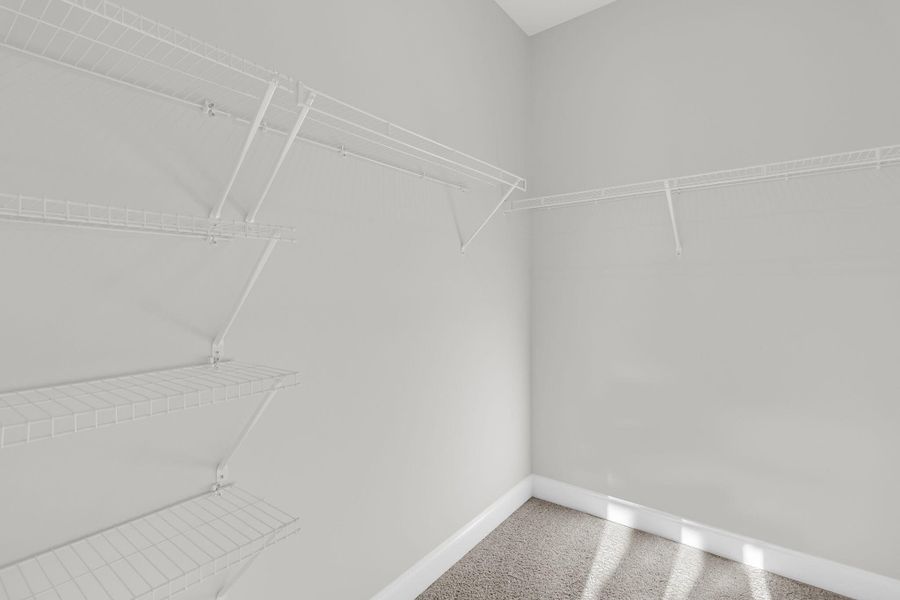 Spacious, unfurnished interior of a new home in Tidewater at Lakes of Cane Bay, Summerville (Image 23).