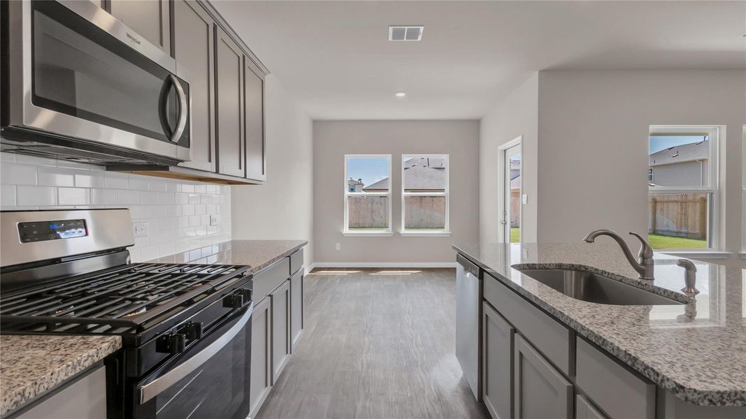 Furnished interior view inside a new home in Carillon, Manor (Image 12).