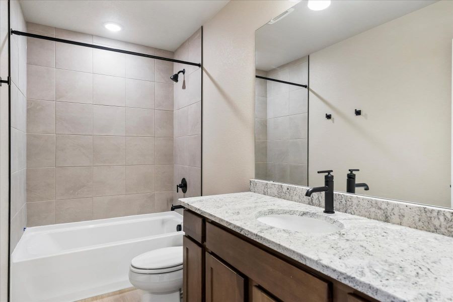 Furnished interior view inside a new home in The Trails at Aspen Ridge, Colorado Springs (Image 9).