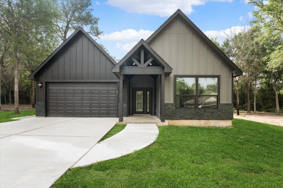 Front exterior of a new home in , Hempstead, TX, highlighting curb appeal (Image 20). Front exterior of a new home in , Hempstead, TX, highlighting curb appeal (Image 20).