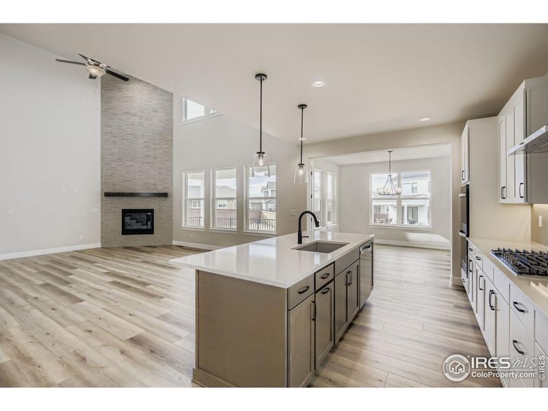 Furnished interior view inside a new home in RainDance National 60/70, Windsor (Image 8).