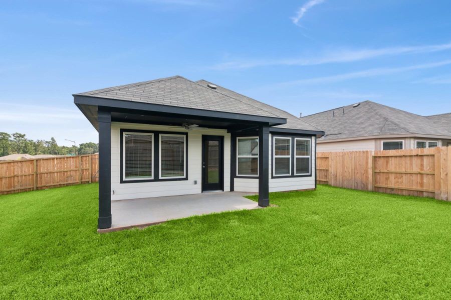 Front exterior of a new home in Moran Ranch, Willis, TX, highlighting curb appeal (Image 7). Front exterior of a new home in Moran Ranch, Willis, TX, highlighting curb appeal (Image 7).