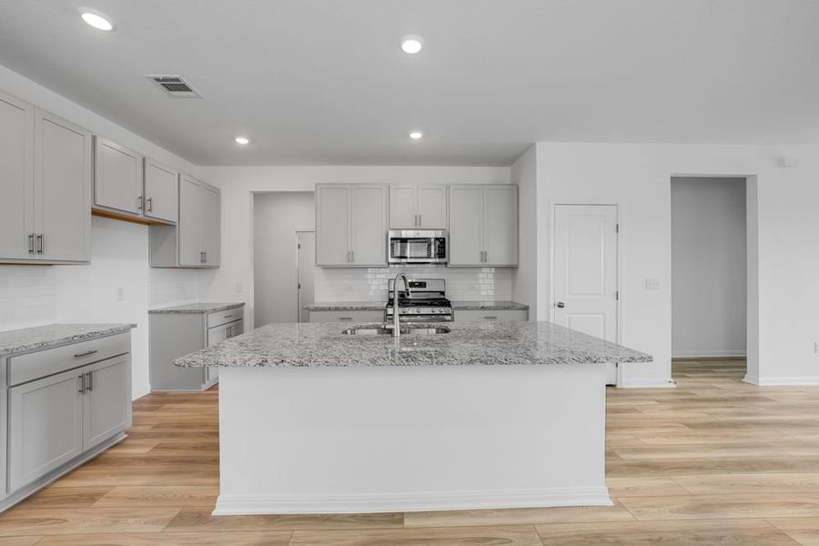 Furnished interior view inside a new home in Longview 40s, Del Valle (Image 4).