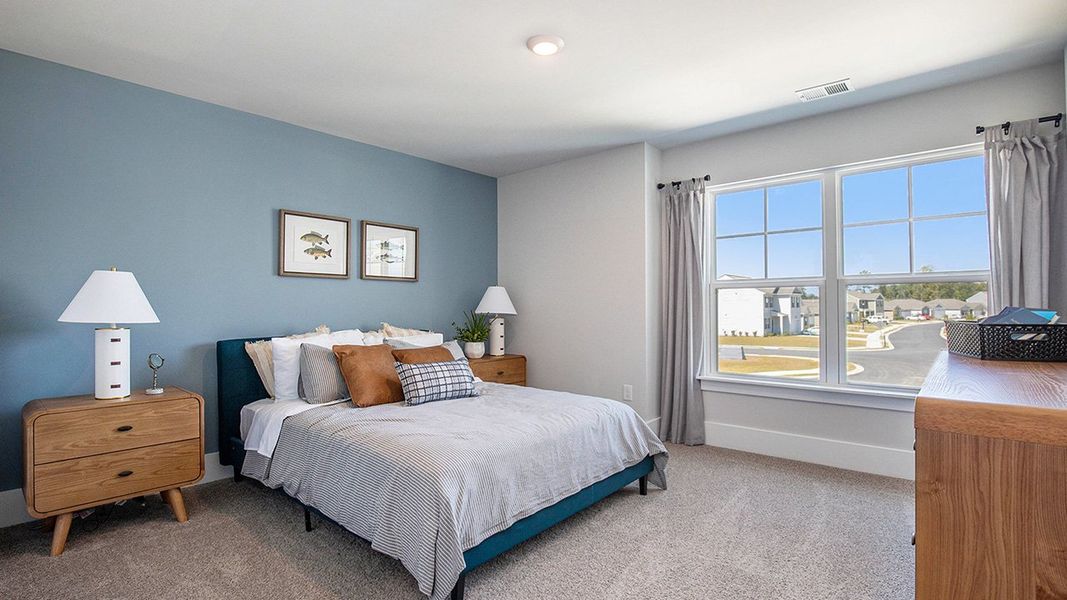 Representative furnished interior of a home built from the HARBOR OAK by D.R. Horton in The Forest at Black Bear, Longs (Image 18).