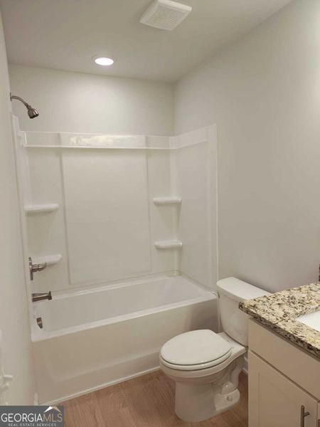 Furnished interior view inside a new home in The Fairways at Mirror Lake, Villa Rica (Image 7).