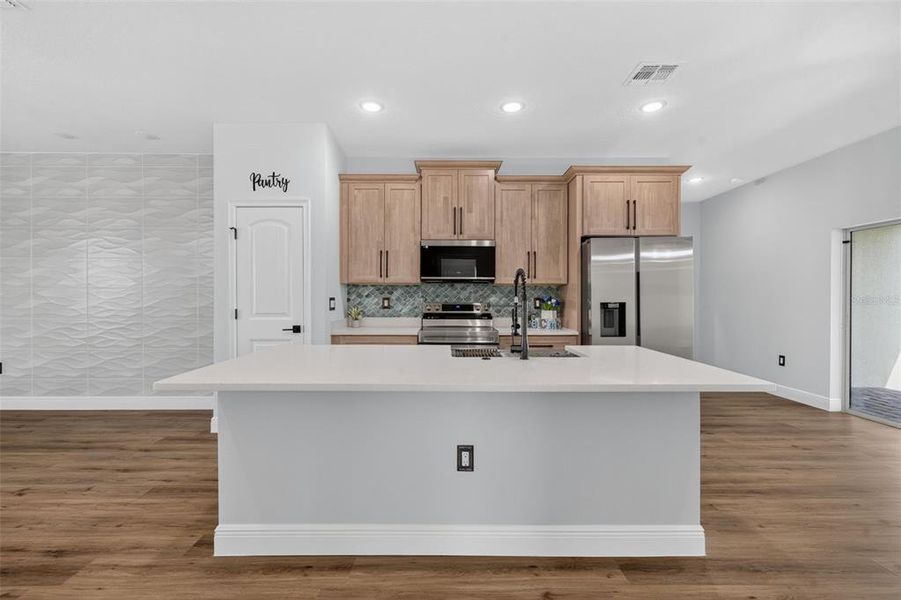 Furnished interior view inside a new home in , Poinciana (Image 5).