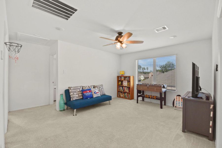 Furnished interior view inside a new home in , Conroe (Image 7).