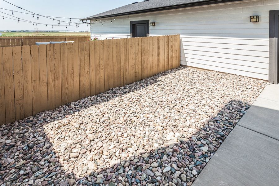Exterior details and patio area of a home in Prairie Song, Windsor (Image 27). Exterior details and patio area of a home in Prairie Song, Windsor (Image 27).
