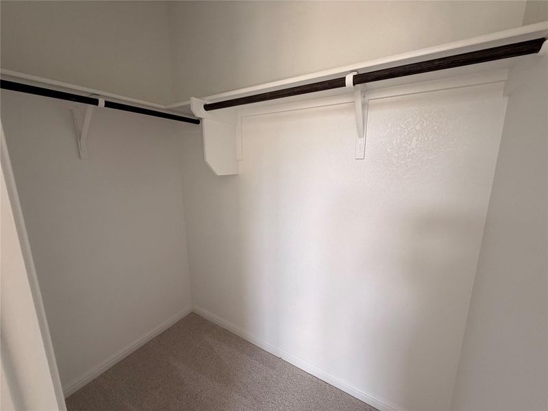 Spacious, unfurnished interior of a new home in The Colony, Bastrop (Image 7).