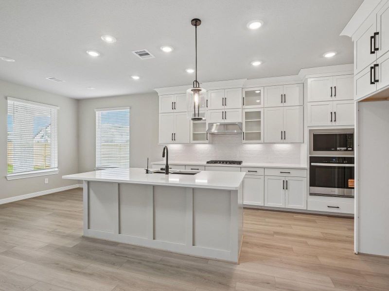 Furnished interior view inside a new home in Massey Oaks - Estate Series, Pearland (Image 6).