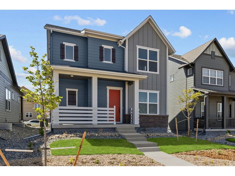 Front exterior of a new home in Kinston Cottage, Loveland, CO, highlighting curb appeal (Image 29). Front exterior of a new home in Kinston Cottage, Loveland, CO, highlighting curb appeal (Image 29).