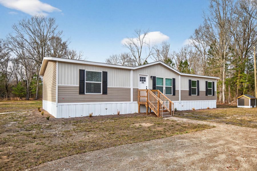 Exterior details and patio area of a home in , Vance (Image 30).
