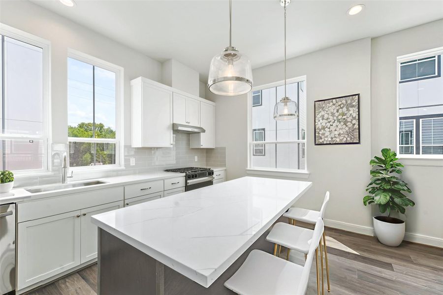 Furnished interior view inside a new home in The Corner At Buffalo Pointe, Houston (Image 17).