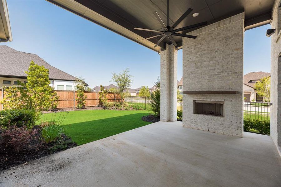 Exterior details and patio area of a home in Light Farms Graham/Reagan, Celina (Image 24).