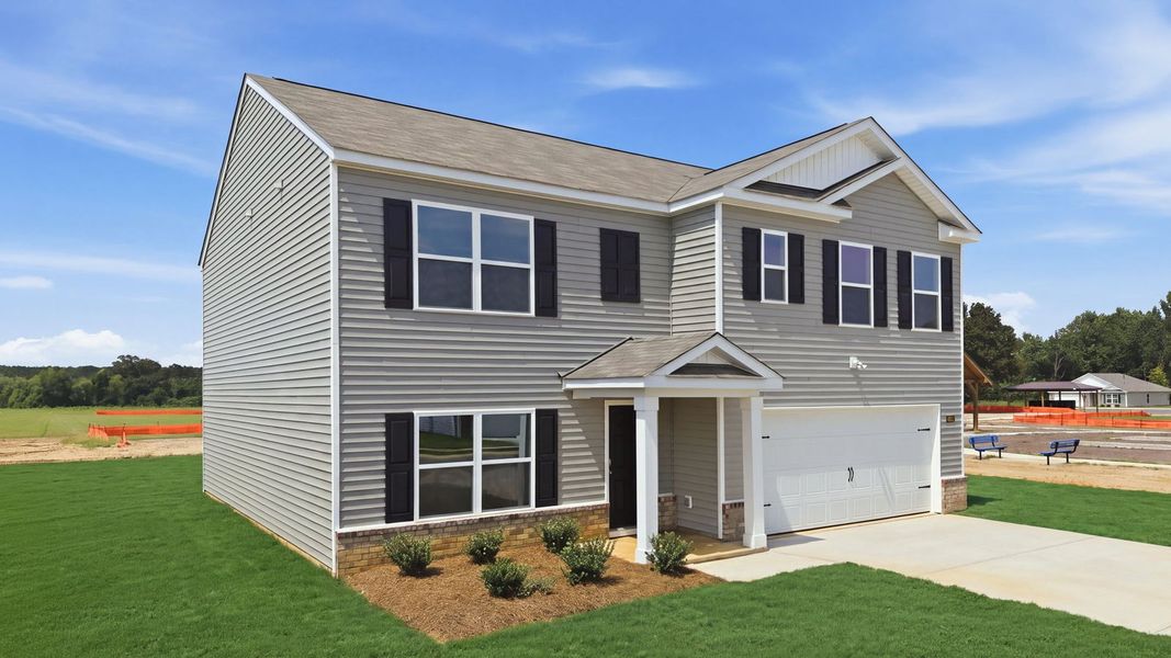 Front exterior of a new home in Bynum Farms, Farmville, NC, highlighting curb appeal (Image 21). Front exterior of a new home in Bynum Farms, Farmville, NC, highlighting curb appeal (Image 21).