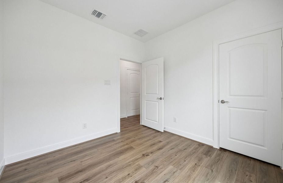 Spacious, unfurnished interior of a new home in Del Webb in Chambers Creek, Willis (Image 22).