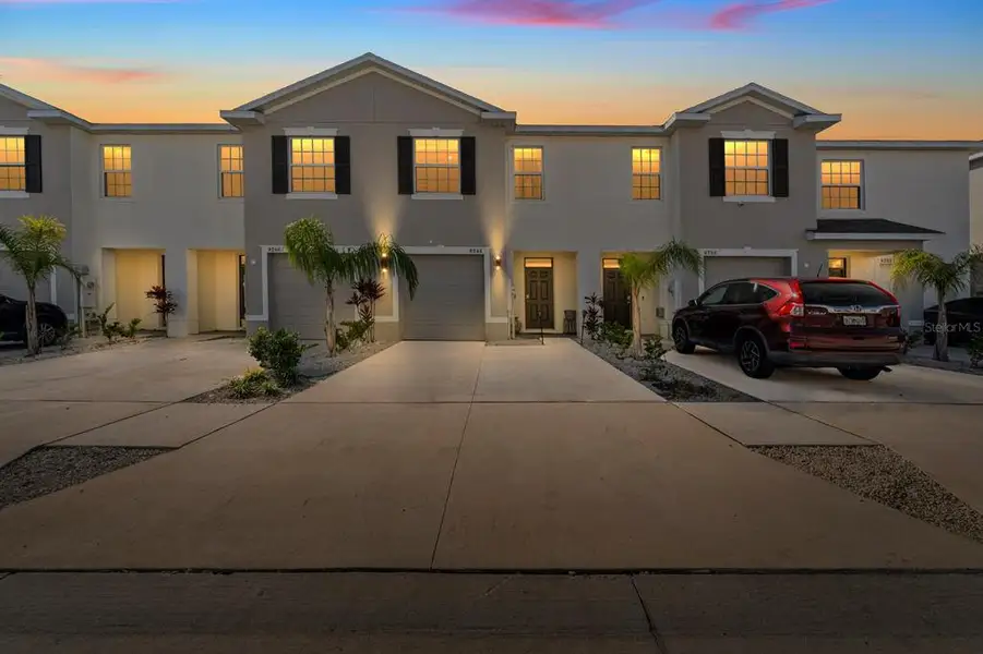 Front exterior of a new home in , Tampa, FL, highlighting curb appeal (Image 1). Front exterior of a new home in , Tampa, FL, highlighting curb appeal (Image 1).