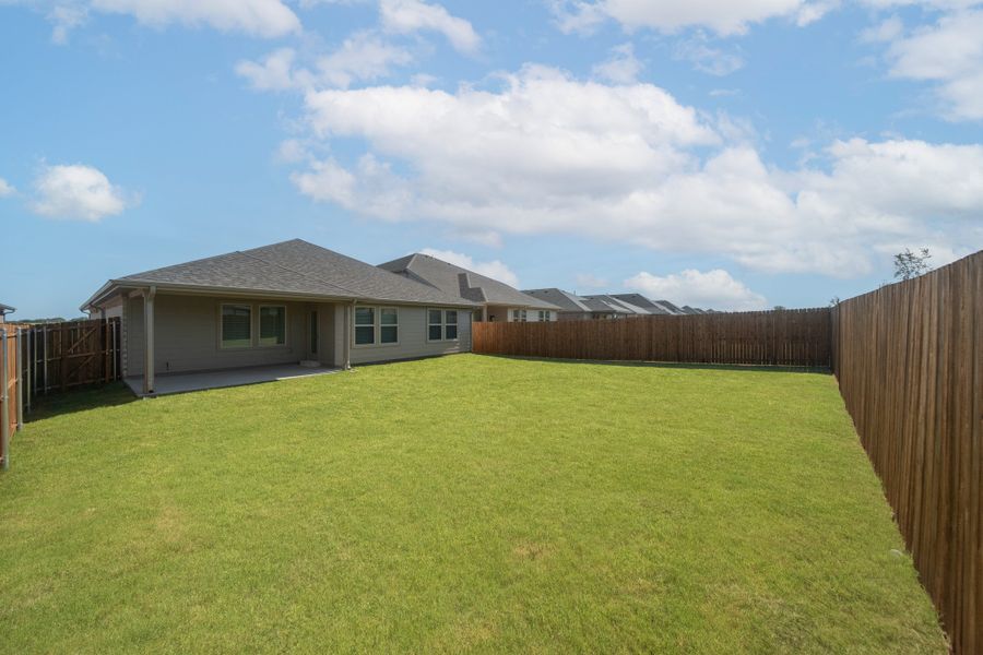 Exterior details and patio area of a home in Verandah, Royse City (Image 2).