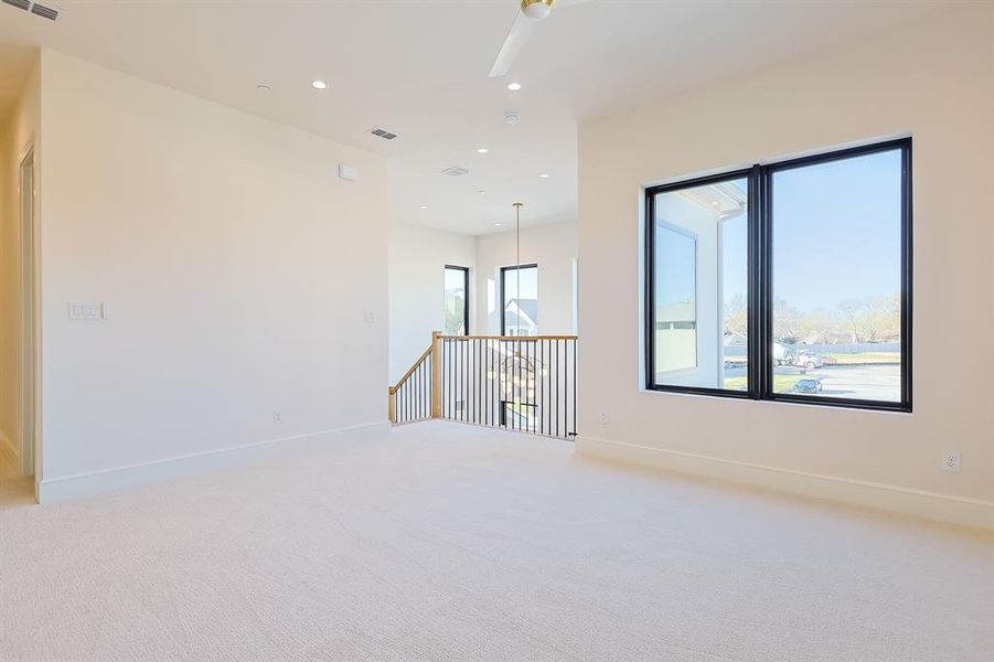 Spacious, unfurnished interior of a new home in Dove Station, Grapevine (Image 22).