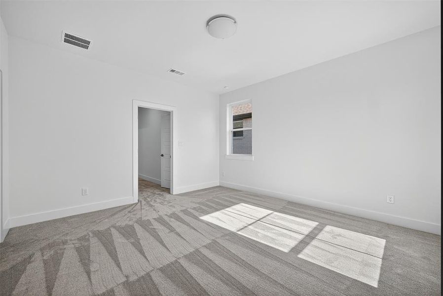 Spare room with light colored carpet Spare room with light colored carpet