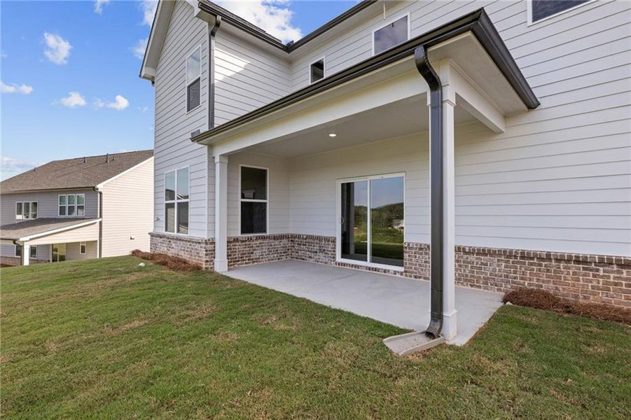 Exterior details and patio area of a home in The Estates at Gainesville Township, Gainesville (Image 3).