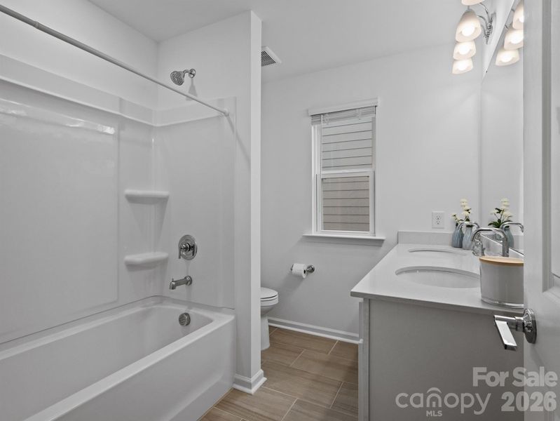 Furnished interior view inside a new home in Riverstone, Monroe (Image 24).