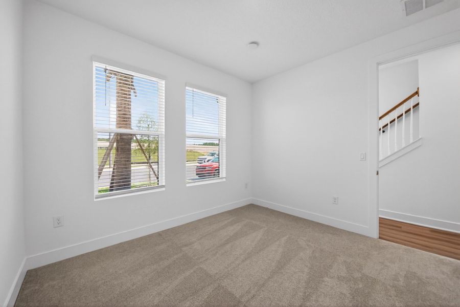 Spacious, unfurnished interior of a new home in Parkview at Hamlin, Winter Garden (Image 15).