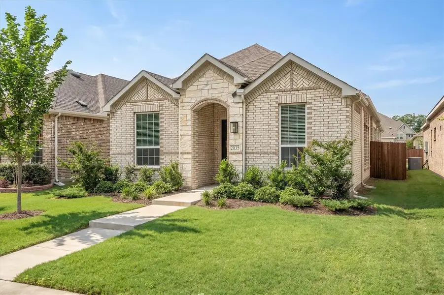Front exterior of a new home in , Garland, TX, highlighting curb appeal (Image 24).