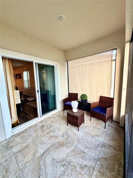 Exterior details and patio area of a home in Windrose, Apopka (Image 3).