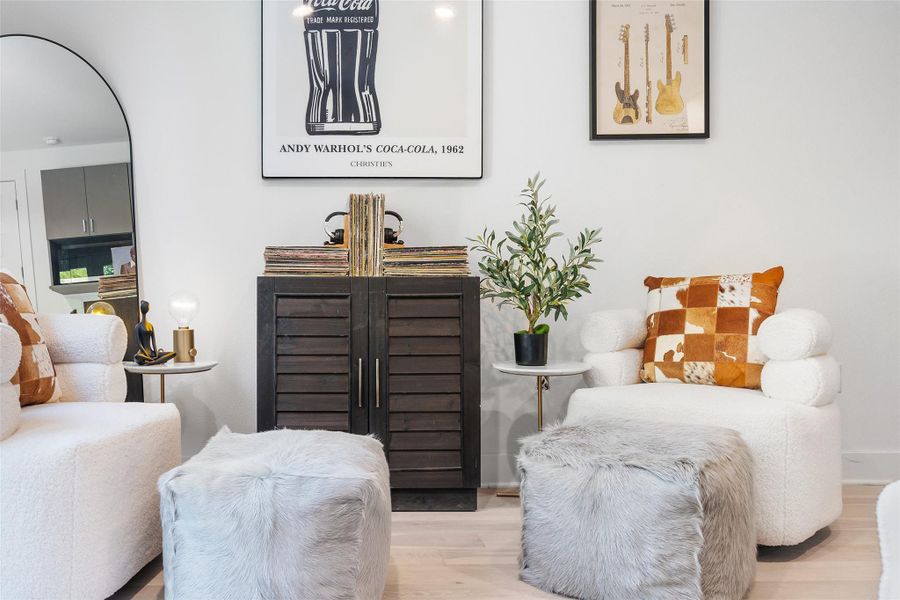 Sitting room with wood finished floors