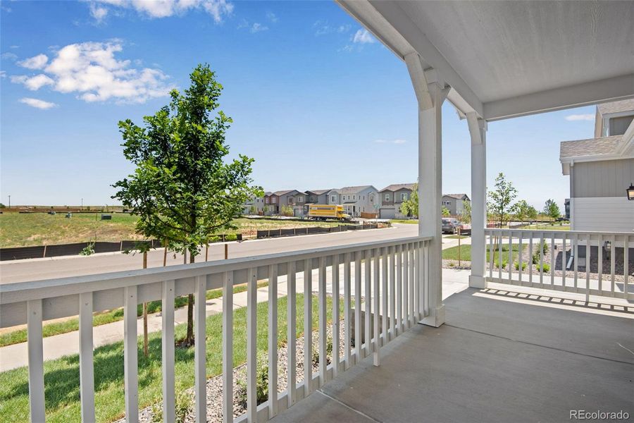 Exterior details and patio area of a home in Reunion Ridge, Commerce City (Image 30).