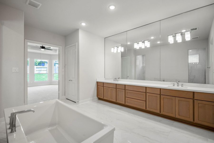 Furnished interior view inside a new home in The Woodlands Hills, Willis (Image 16). Furnished interior view inside a new home in The Woodlands Hills, Willis (Image 16).