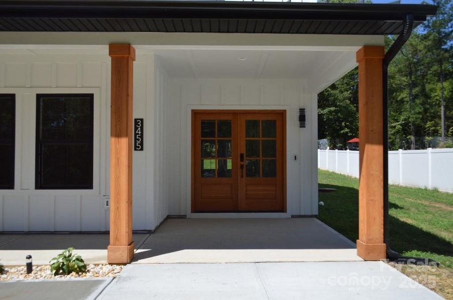 Front exterior of a new home in , Davidson, NC, highlighting curb appeal (Image 25).