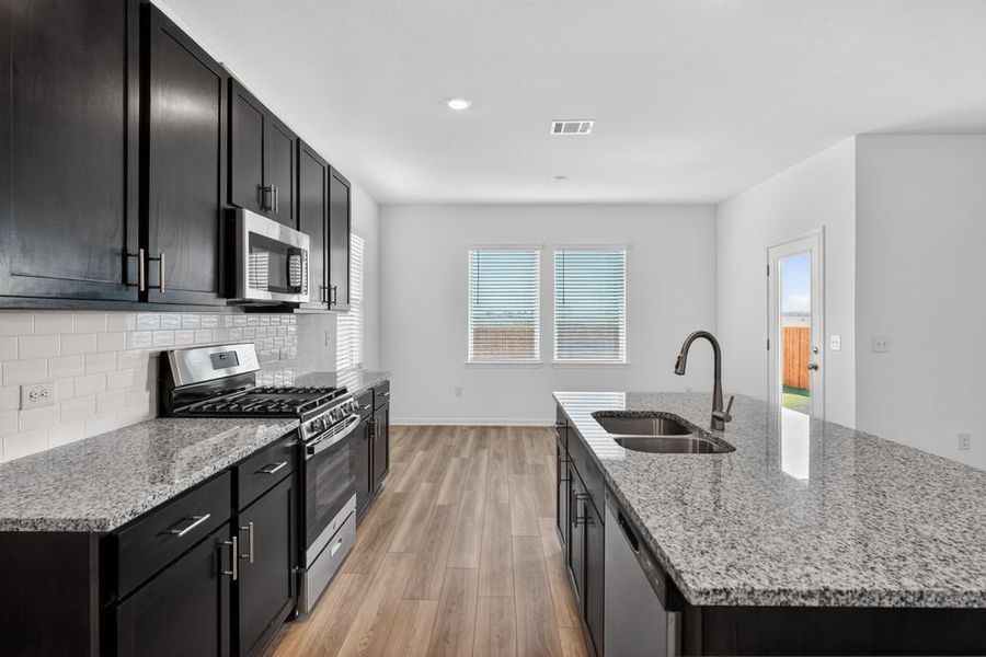 Furnished interior view inside a new home in Longview, Del Valle (Image 7).