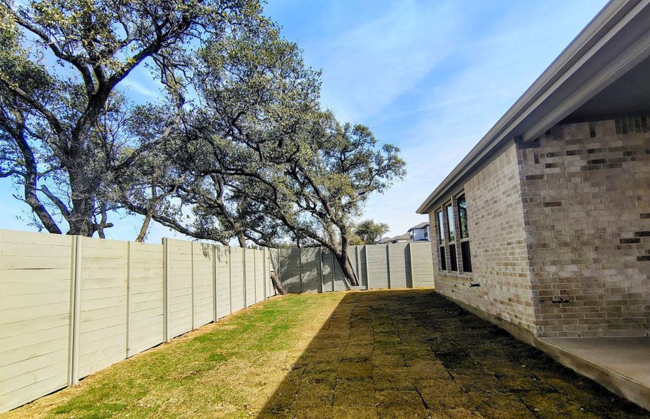 Exterior details and patio area of a home in Wolf Ranch, Georgetown (Image 3).