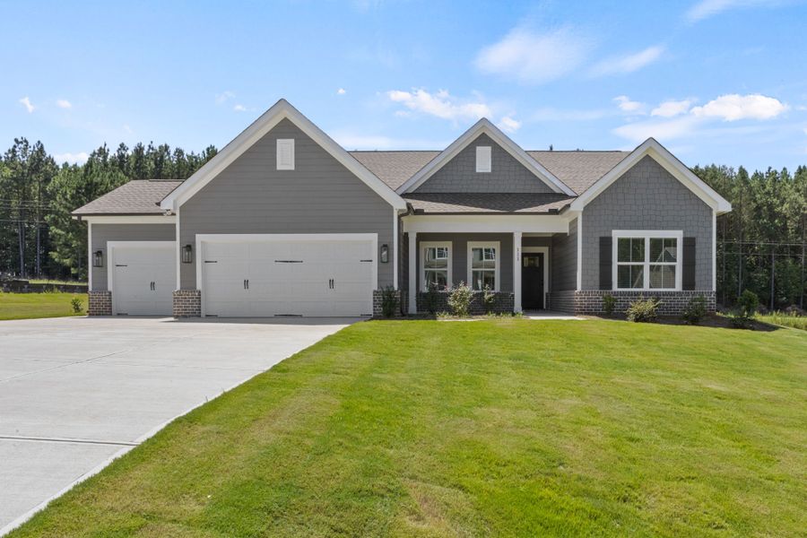 Front exterior of a new home in Cherokee Knoll, Williamston, SC, highlighting curb appeal (Image 1). Front exterior of a new home in Cherokee Knoll, Williamston, SC, highlighting curb appeal (Image 1).