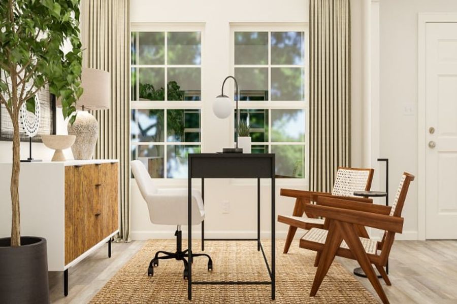 A room with a table chairs and a window with a plant.