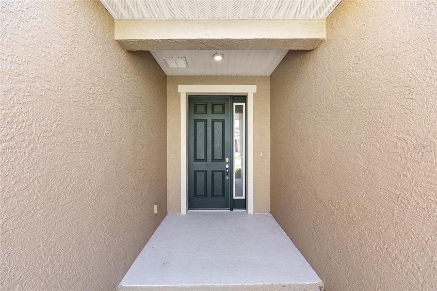 Exterior details and patio area of a home in Calesa Township, Ocala (Image 3).